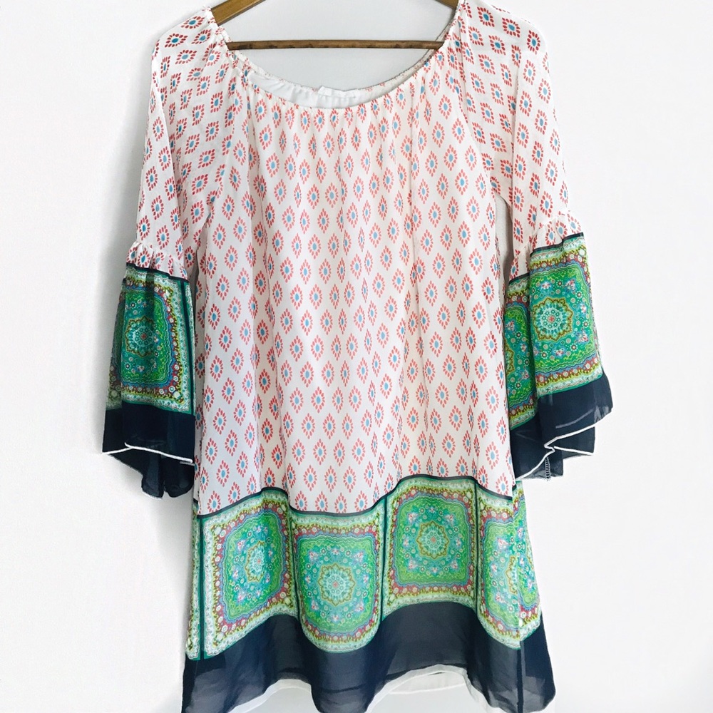 Million Bullpup wide neck, long sleeve dress
